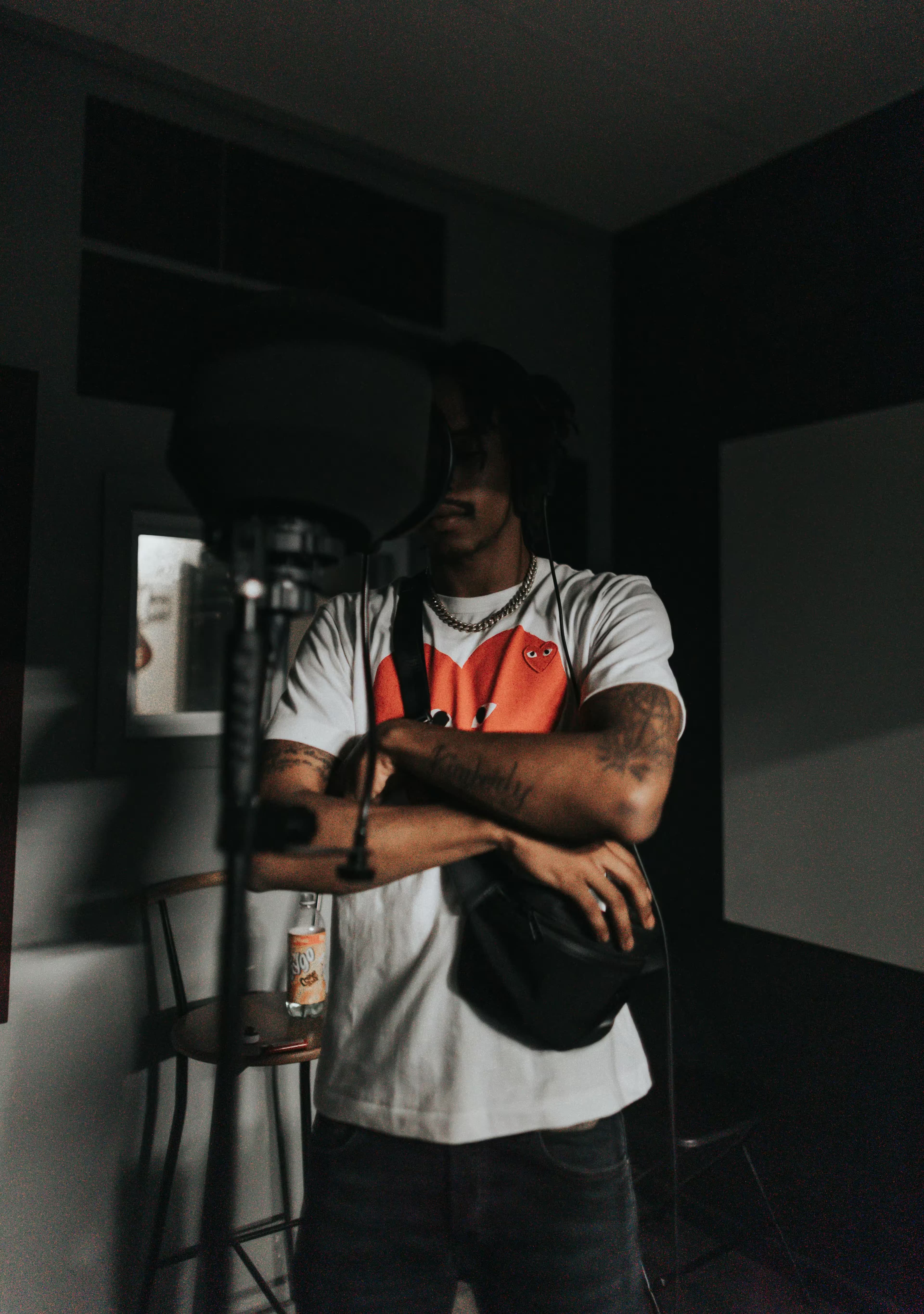 Independent artist recording vocals in a studio, symbolizing easy music upload and distribution